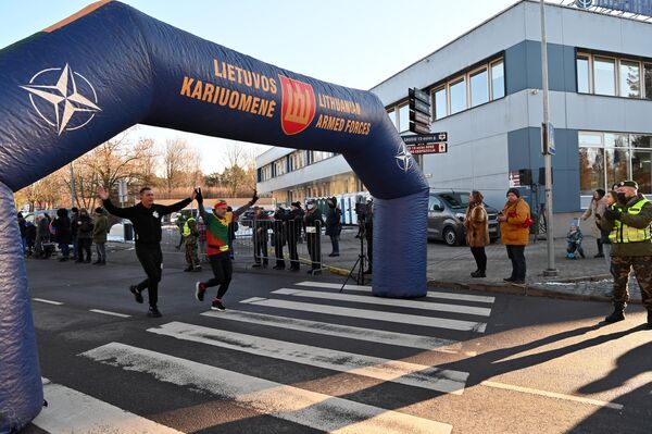 Nuotraukoje: bėgimo &quot;Gyvybės ir mirties keliu&quot; Vilniuje dalyviai. - Sputnik Lietuva