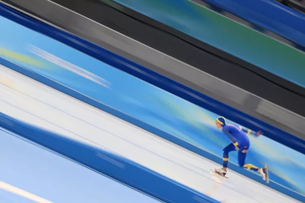 Švedas Nilsas Van Der Poelis 2022 metų vasario 6 dieną Pekino nacionaliniame greitojo čiuožimo ovale dalyvauja vyrų greitojo čiuožimo 5 000 m rungtyje. Švedas Nilsas Van Der Poelis 2022 metų vasario 6 dieną Pekino nacionaliniame greitojo čiuožimo ovale dalyvauja vyrų greitojo čiuožimo 5 000 m rungtyje. - Sputnik Lietuva