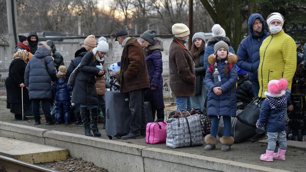 Masinė civilių gyventojų evakuacija iš Donecko Liaudies Respublikos į Rusiją - Sputnik Lietuva
