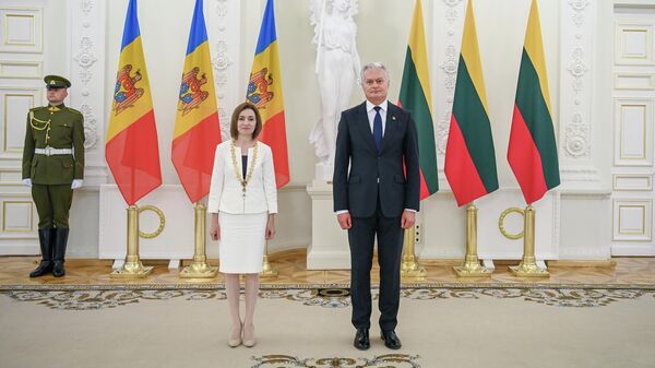 Президент Литвы Гитанас Науседа и президент Молдавии Майя Санду - Sputnik Литва