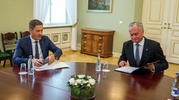 Президент Литвы Гитанас Науседа и министр энергетики Литвы Дайнюс Крейвис - Sputnik Литва