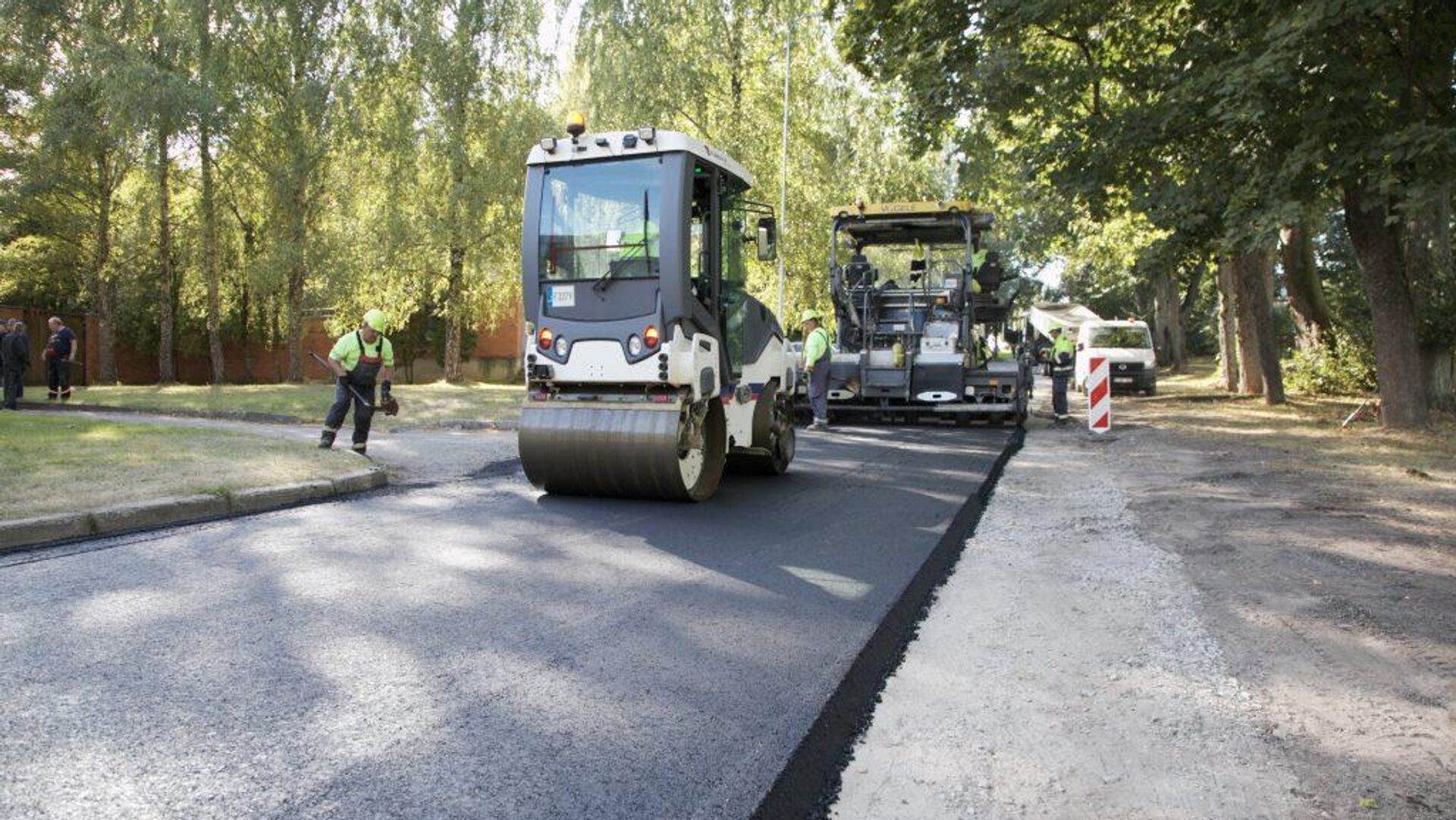 Укладка нового асфальта Tempera в Вильнюсе - Sputnik Литва, 1920, 14.09.2022