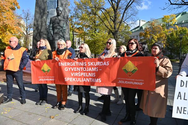 Мероприятие приурочено к Всемирному дню действий за достойный труд. - Sputnik Литва