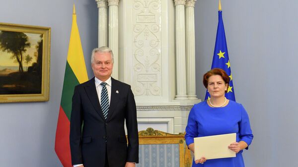 Президент Литвы Гитанас Науседа и посол Литвы в Индии Диана Мицкявичене - Sputnik Литва
