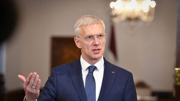 Министр иностранных дел Латвии Кришьянис Кариньш - Sputnik Литва