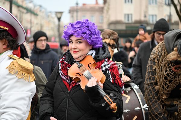 На фото: участница костюмированного шествия. - Sputnik Литва