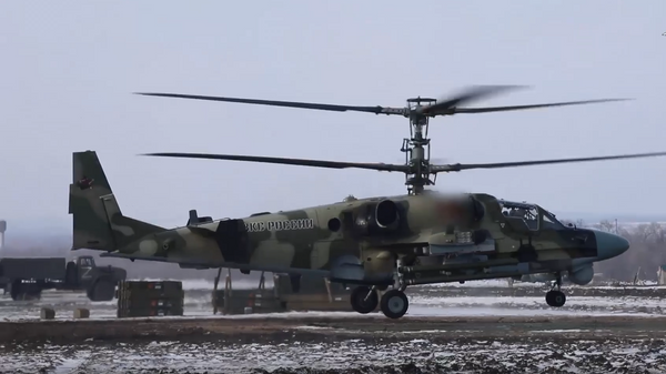 Боевая работа экипажей вертолетов Ка-52 армейской авиации ЗВО - Sputnik Литва