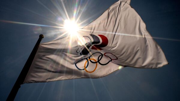 Флаг Международного олимпийского комитета, архивное фото - Sputnik Литва