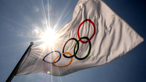 Флаг Международного олимпийского комитета, архивное фото - Sputnik Литва