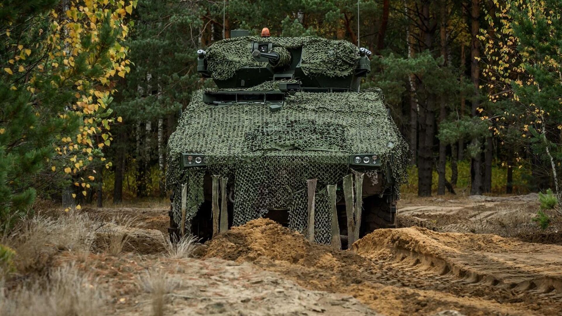 Литовская военная боевая машина пехоты Vilkas, архивное фото Литовская военная боевая машина пехоты Vilkas, архивное фото - Sputnik Литва, 1920, 21.03.2025