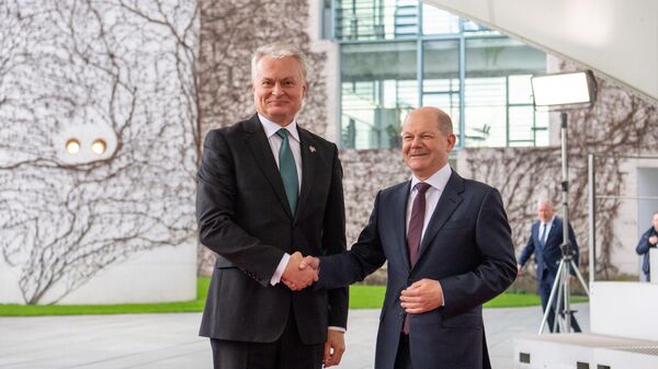 Президент Литвы Гитанас Науседа и канцлер Германии Олаф Шольц - Sputnik Литва