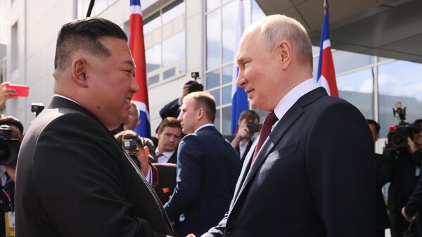 Президент РФ Владимир Путин и лидер КНДР Ким Чен Ын - Sputnik Литва