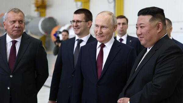 Президент РФ Владимир Путин и лидер КНДР Ким Чен Ын - Sputnik Литва