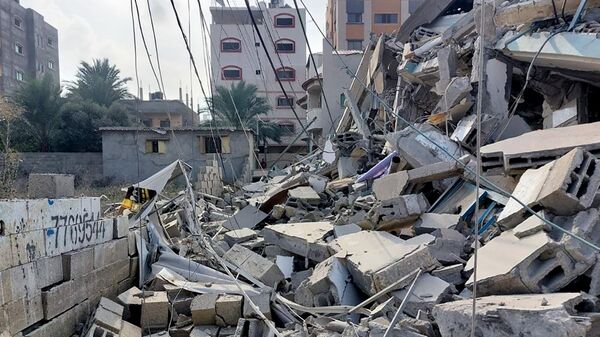 Обломки зданий, пострадавших в результате ракетных ударов ВС Израиля по Газе - Sputnik Литва