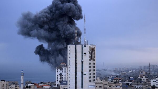 Обстрел зданий в палестинском городе Газа - Sputnik Литва