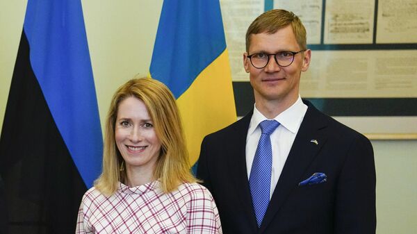 Премьер-министр Эстонии Кая Каллас и ее муж Арво Халлик - Sputnik Литва
