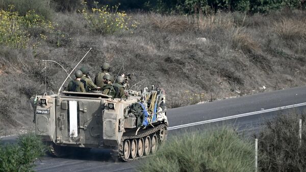 Военные Израиля около Сдерота рядом с границей с сектором Газа - Sputnik Литва