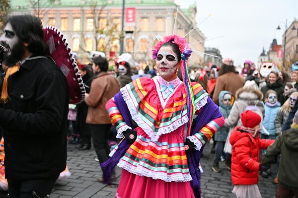 Этот праздник был организован литовско-мексиканской общиной, которая пригласила присоединиться всех желающих. - Sputnik Литва