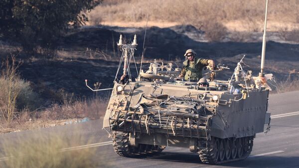 Конвой израильских военных на границе Израиля и сектора Газа - Sputnik Литва