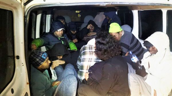 Мигранты из Афганистана, задержанные в Литве - Sputnik Литва