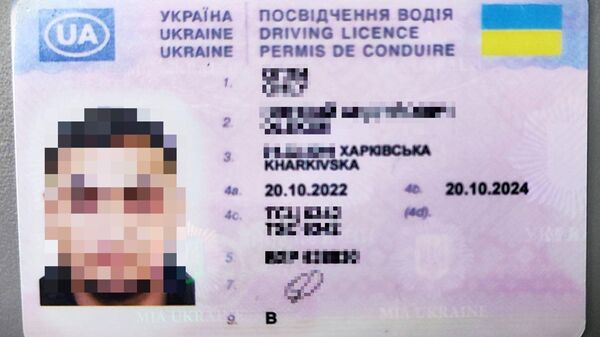 Поддельные водительские права гражданина Украины - Sputnik Литва