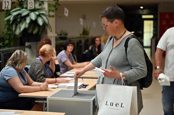Избирательные участки в этот день будут работать с 7:00 до 20:00. - Sputnik Литва