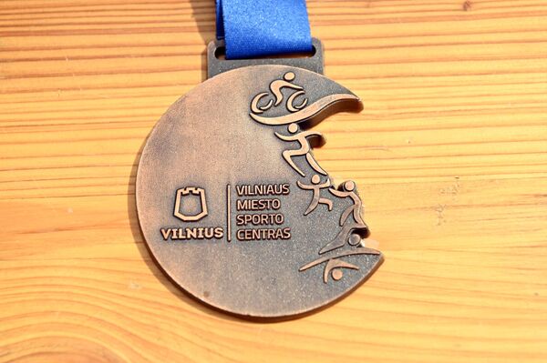 На фото: медаль участника соревнований. - Sputnik Литва