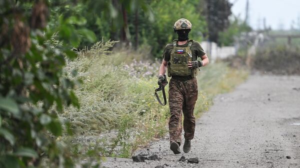 Российский военнослужащий в зоне спецоперации, архивное фото - Sputnik Литва