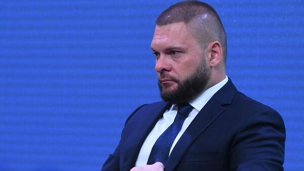 Военный корреспондент Евгений Поддубный - Sputnik Литва