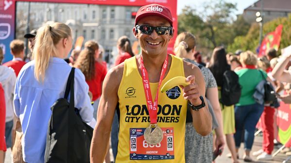 На фото: участник Вильнюсского марафона. - Sputnik Литва