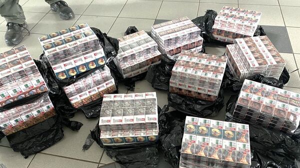 Контрабандные сигареты из Белоруссии, изъятые литовской таможней - Sputnik Литва