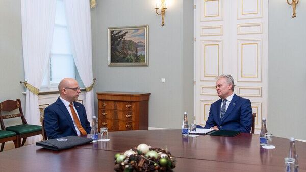Министр юстиции Литвы Римантас Моцкус и президент Литвы Гитанас Науседа - Sputnik Литва
