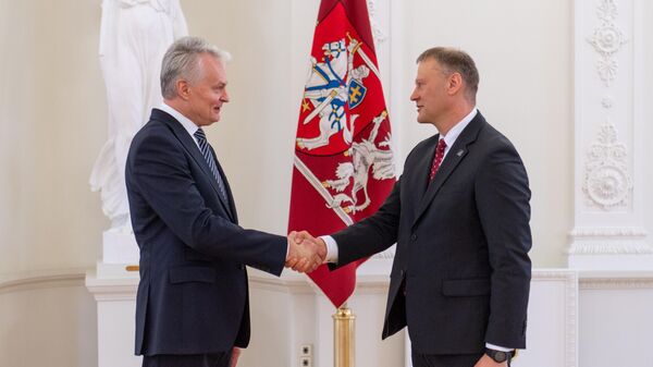 Президент Литвы Гитанас Науседа принимает присягу директора Департамента государственной безопасности Ремигиюса Бридикиса - Sputnik Литва