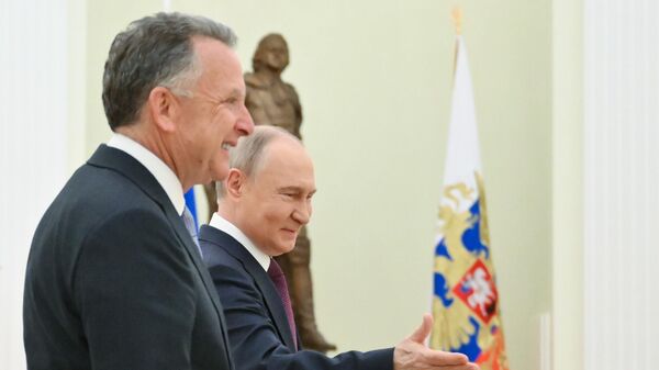 Президент РФ Владимир Путин и спецпосланник президента США Стивен Уиткофф, архивное фото - Sputnik Литва