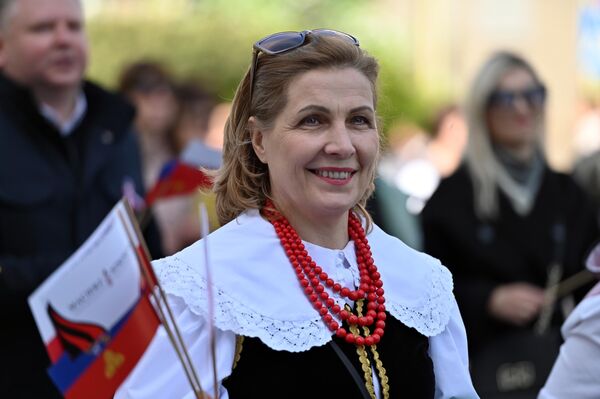 Организаторы акции подчеркивают, что ее цель — показать, что поляки в Литве — это сплоченное и организованное сообщество. Организаторы акции подчеркивают, что ее цель — показать, что поляки в Литве — это сплоченное и организованное сообщество. - Sputnik Литва