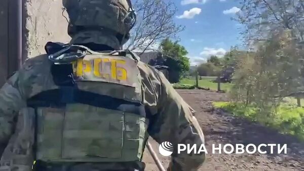 Задержание и допрос россиянина, который по заказу украинских спецслужб готовил теракт - Sputnik Литва
