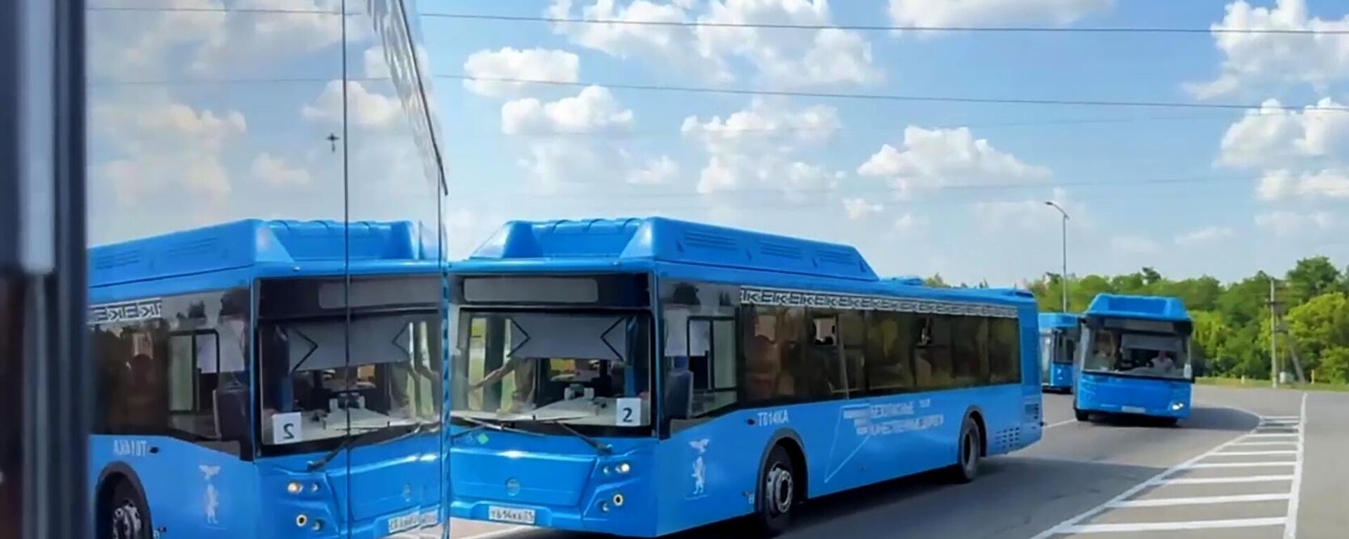 Автобусы с российскими военнослужащими, возвращенными из украинского плена, архивное фото - Sputnik Литва, 1920, 23.05.2025
