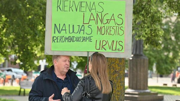 В Вильнюсе прошла акция протеста против налога на недвижимость - Sputnik Литва