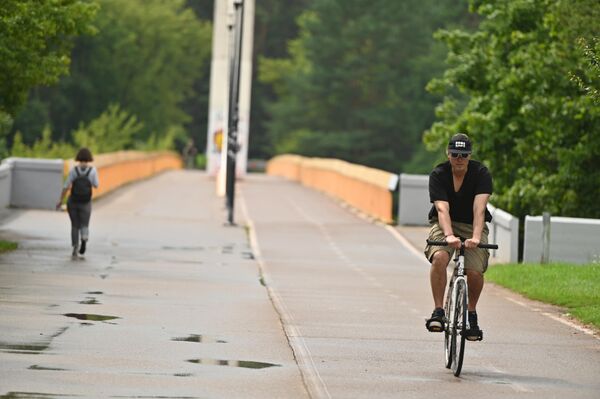 Однако, несмотря на странности погоды, активным горожанам это не мешало заниматься спортом. - Sputnik Литва