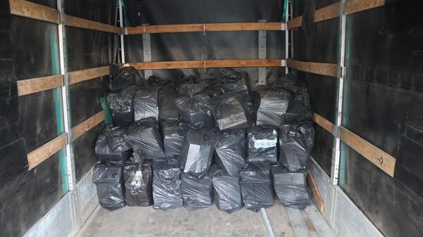 Партия контрабандных сигарет, которую перехватили литовские пограничники - Sputnik Литва