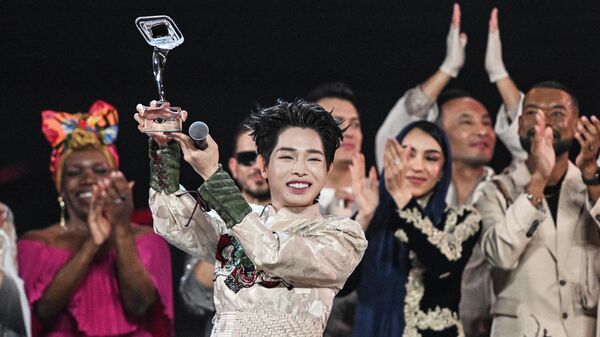 Победитель международного музыкального конкурса Интервидение Дык Фук - Sputnik Литва