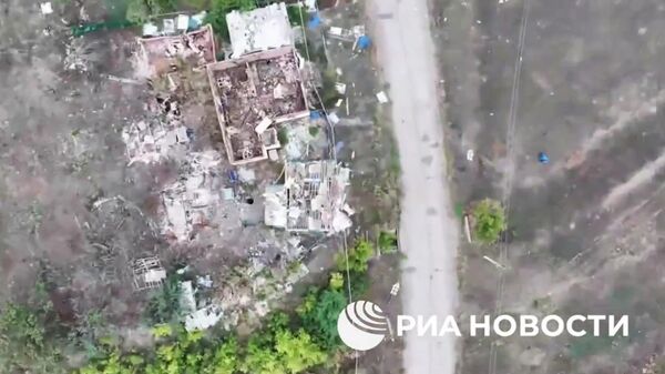 Кадры освобождения Переездного в ДНР российскими войсками - Sputnik Литва