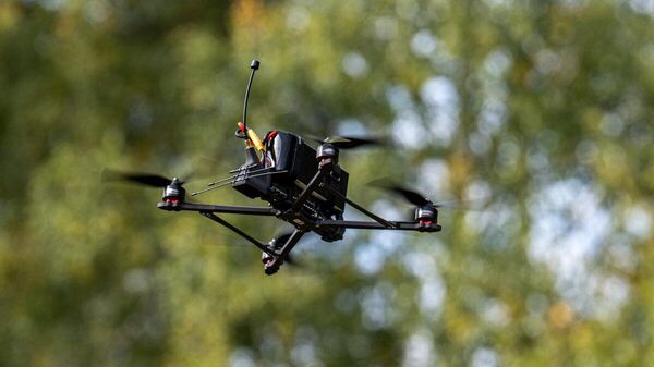 Беспилотник в небе, архивное фото - Sputnik Литва