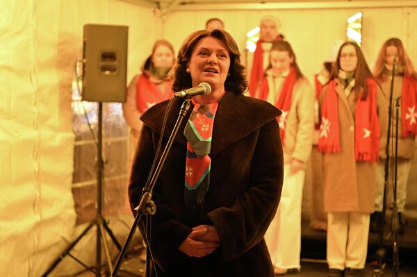 Традиционно акцию для обездоленных и пожилых людей посетила первая леди страны Диана Науседене. - Sputnik Литва