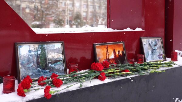 Акция в память о погибших в результате атаки БПЛА в Херсонской области - Sputnik Литва