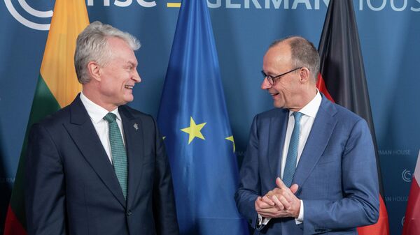 Президент Литвы Гитанас Науседа и канцлер ФРГ Фридрих Мерц - Sputnik Литва