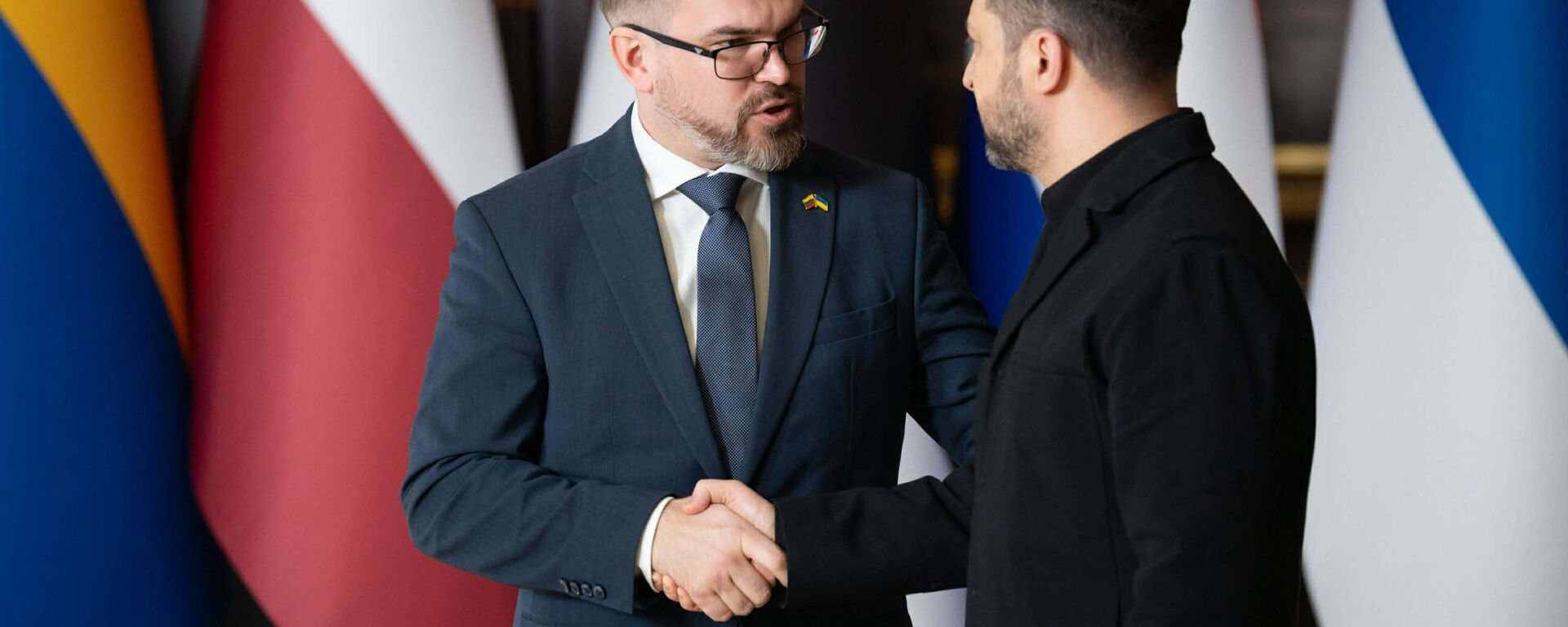 Министр обороны Литвы Робертас Каунас и Владимир Зеленский - Sputnik Литва, 1920, 25.02.2026