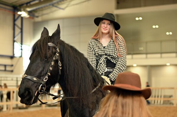 На фото: участники конной выставка  Žirgų Grand Show - 2026. - Sputnik Литва