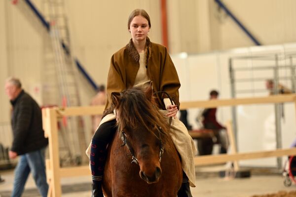 На фото: участники конной выставка  Žirgų Grand Show - 2026. - Sputnik Литва