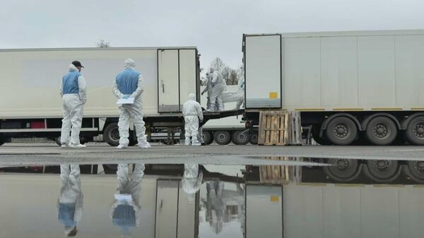 Передача тел военнослужащих между РФ и Украиной - Sputnik Литва